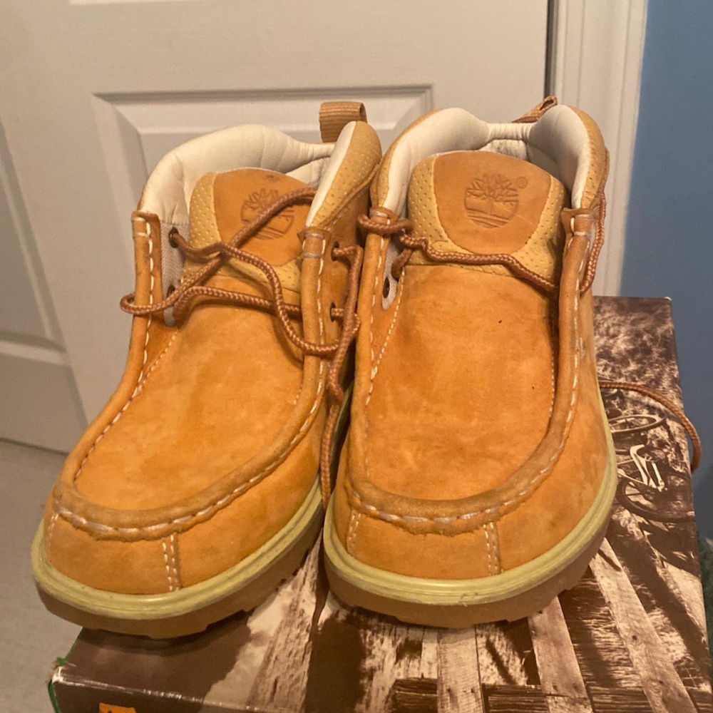 Boys Timberland boots.
